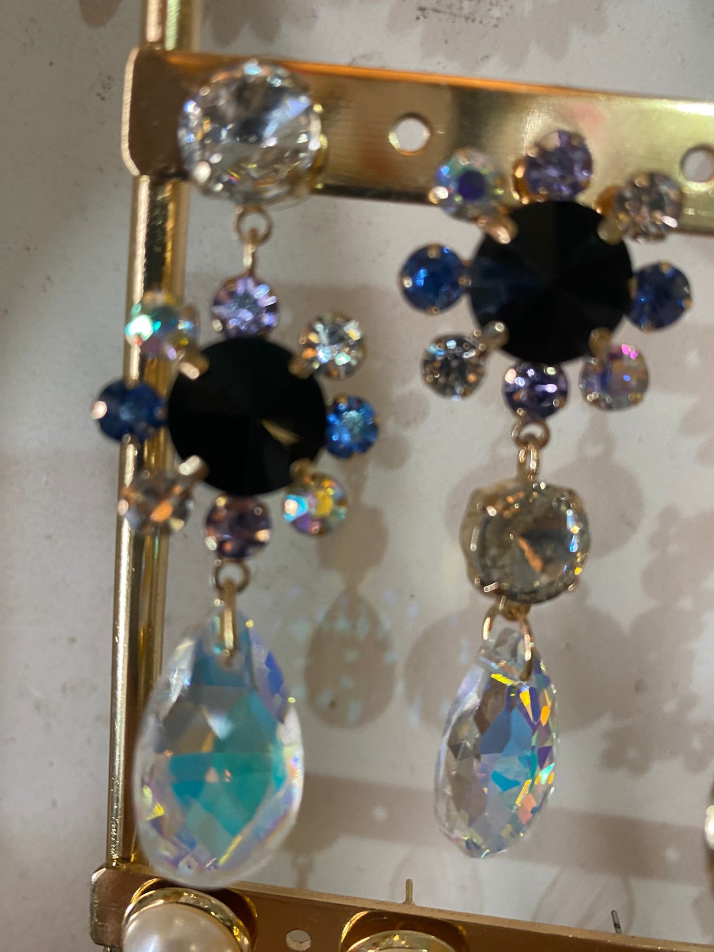 BOUCLE OREILLE IN.CRO.YABLE PORTANT